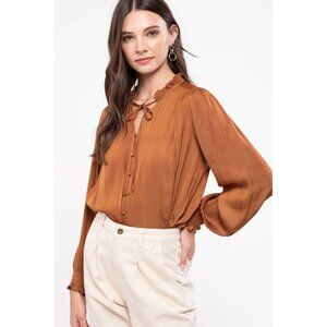 Rust colored long sleeve satin feel shirt